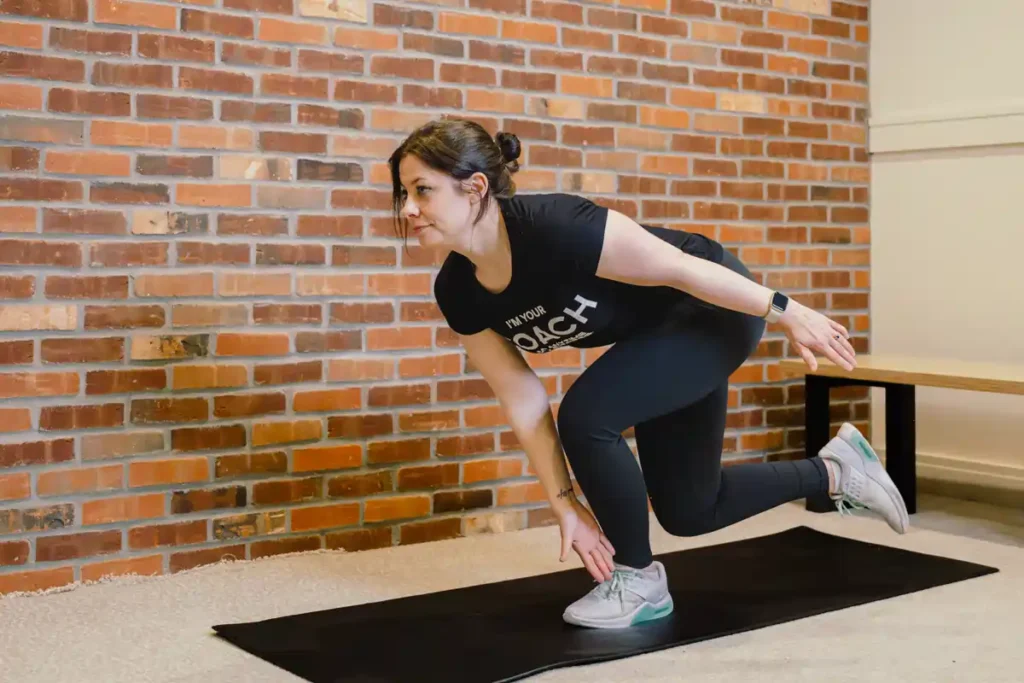 Tone Your Arms in Just One Week: Achieve Results Without the Gym! 1 A person exercising their arms at home with light weights Reigate