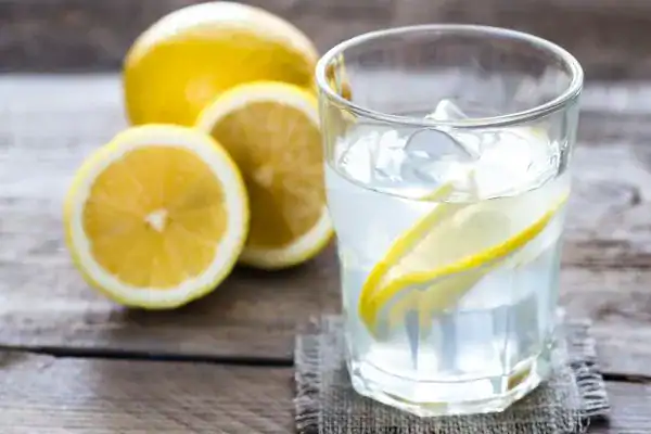 Hydration: The Secret Ingredient for a Toned Stomach and Enhanced Fitness 2 Image of lemon water to aid hydration Reigate