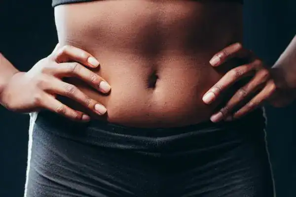Toning Your Stomach: The Ultimate Guide to Achieving a Sculpted Stomach While Shedding Pounds 1 Image of a toned stomach after non surgical treatment Reigate